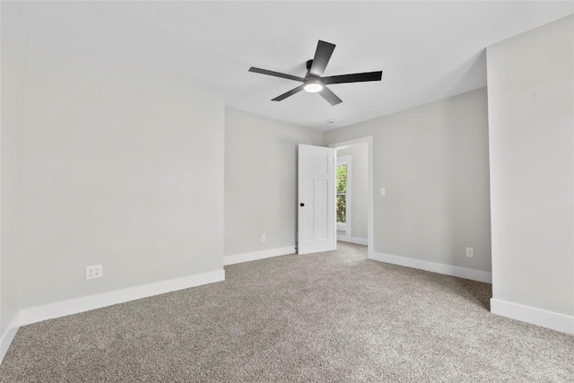 1356 Hinkley Ave NW, Cedar Rapids, IA 52405 - spare room with carpet flooring and ceiling fan