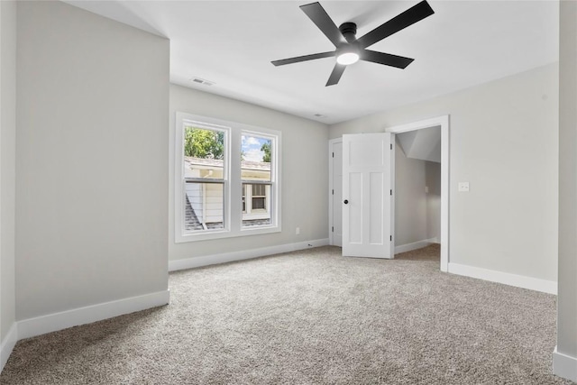 1356 Hinkley Ave NW, Cedar Rapids, IA 52405 - unfurnished bedroom featuring carpet floors and ceiling fan