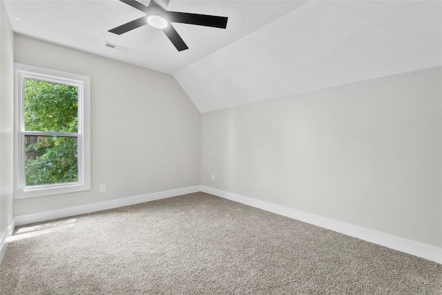 1356 Hinkley Ave NW, Cedar Rapids, IA 52405 - additional living space featuring carpet floors, vaulted ceiling, and ceiling fan