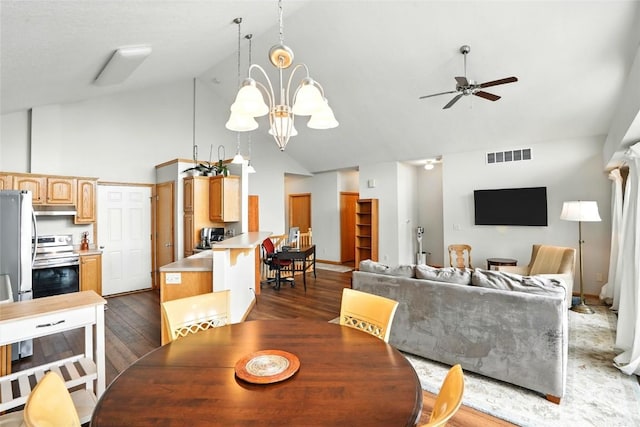 1459 Buckingham Ln, Iowa City, IA 52245 - dining room with high vaulted ceiling, ceiling fan, wood finished floors, and a chandelier