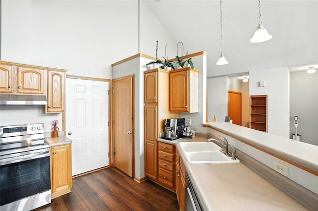 1459 Buckingham Ln, Iowa City, IA 52245 - kitchen with electric range, under cabinet range hood, dark wood finished floors, light countertops, and decorative light fixtures