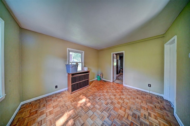 1640 11th St NW, Cedar Rapids, IA 52405 - spare room featuring baseboards