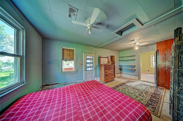 1640 11th St NW, Cedar Rapids, IA 52405 - bedroom featuring a ceiling fan