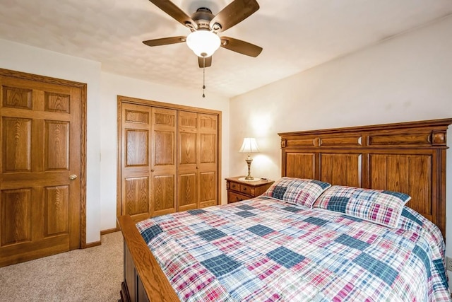 1595 17th Ave, Marion, IA 52302 - carpeted bedroom featuring a closet and a ceiling fan