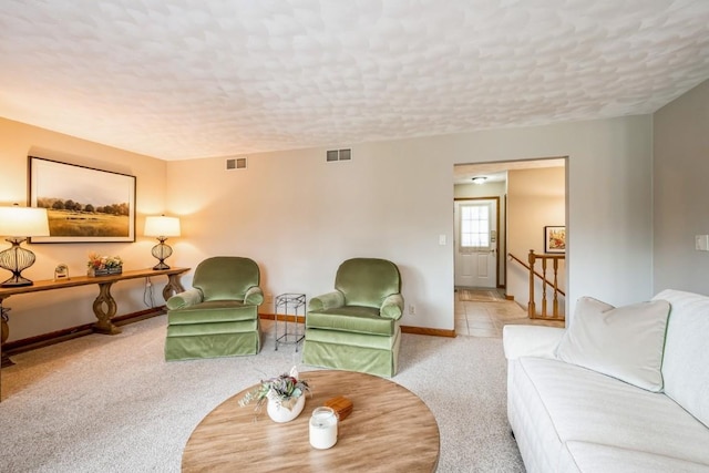 1595 17th Ave, Marion, IA 52302 - living room with a textured ceiling and carpet floors