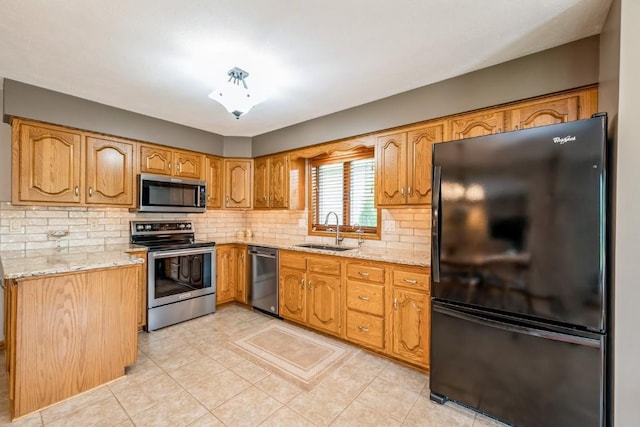 1595 17th Ave, Marion, IA 52302 - kitchen featuring stainless steel appliances, light stone counters, decorative backsplash, light tile patterned floors, and brown cabinets