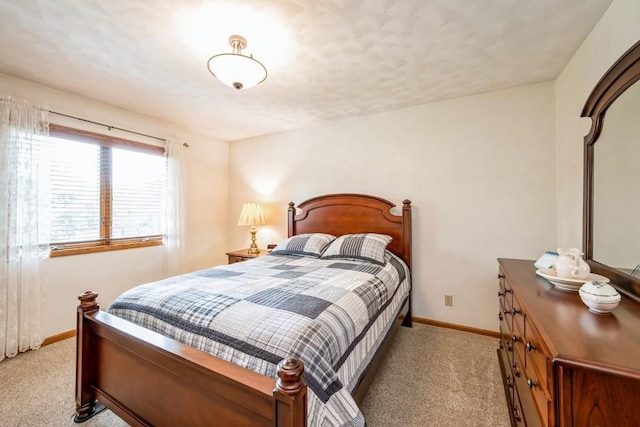 1595 17th Ave, Marion, IA 52302 - bedroom with light colored carpet and baseboards
