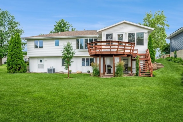 1595 17th Ave, Marion, IA 52302 - back of house featuring a deck, stairway, and a yard