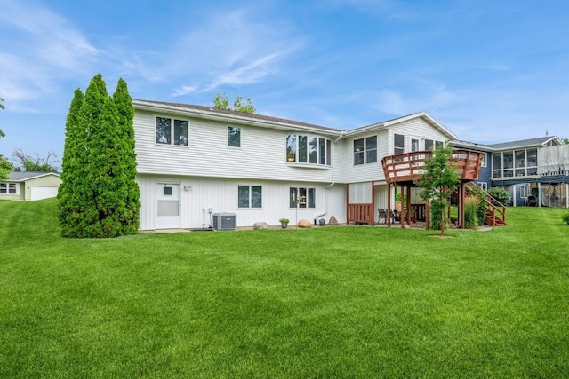 1595 17th Ave, Marion, IA 52302 - rear view of property featuring a deck, a yard, and stairway