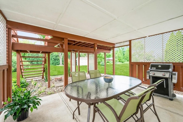 1595 17th Ave, Marion, IA 52302 - sunroom / solarium featuring outdoor dining area