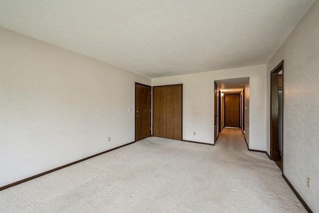 809 Kerry Ln SE Unit 66, Cedar Rapids, IA 52403 - unfurnished bedroom with light colored carpet and a closet