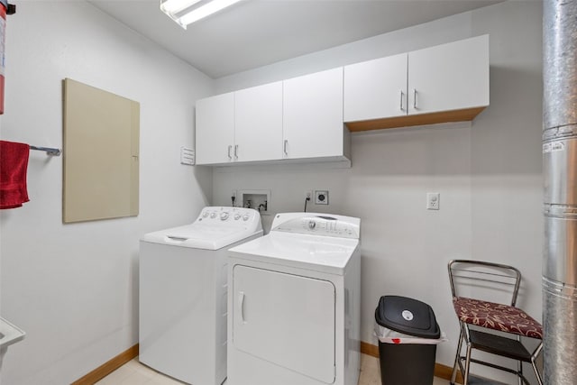 4710 Westchester Dr NE Unit C, Cedar Rapids, IA 52402 - washroom with separate washer and dryer and cabinet space