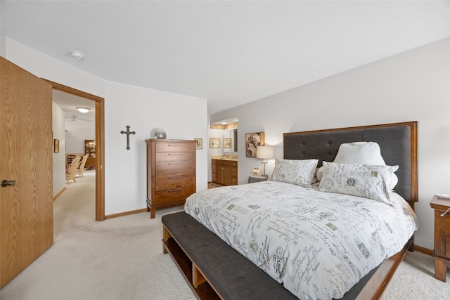 4710 Westchester Dr NE Unit C, Cedar Rapids, IA 52402 - bedroom with light carpet and ensuite bath