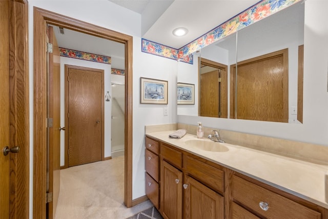 4710 Westchester Dr NE Unit C, Cedar Rapids, IA 52402 - bathroom with vanity and an enclosed shower