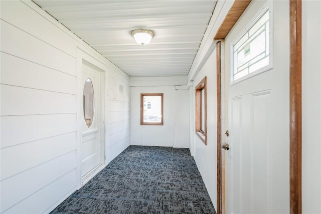 111 Maple St, Luzerne, IA 52257 - hallway with dark carpet and healthy amount of natural light