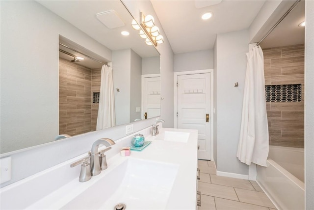 111 Maple St, Luzerne, IA 52257 - bathroom with tile patterned flooring, double vanity, shower / bath combo with shower curtain, and recessed lighting