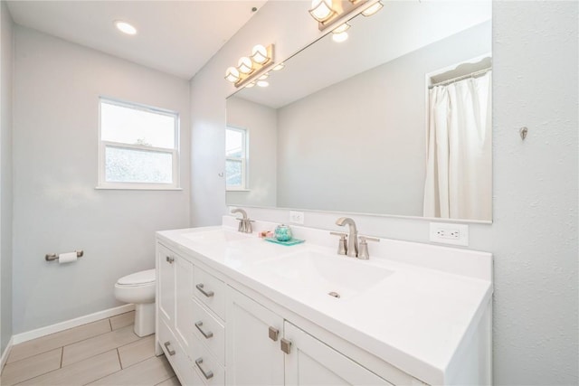 111 Maple St, Luzerne, IA 52257 - full bath with double vanity and tile patterned flooring