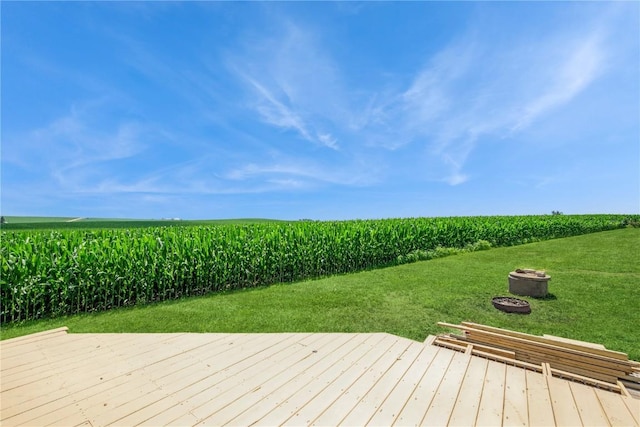 111 Maple St, Luzerne, IA 52257 - wooden terrace featuring agricultural area, an outdoor fire pit, a view of countryside, and a yard