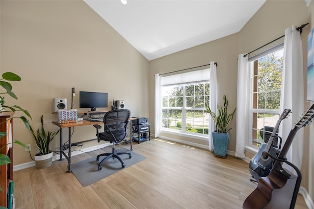 422 Rock Ridge Rd NW, Cedar Rapids, IA 52405 - office space featuring wood finished floors and high vaulted ceiling