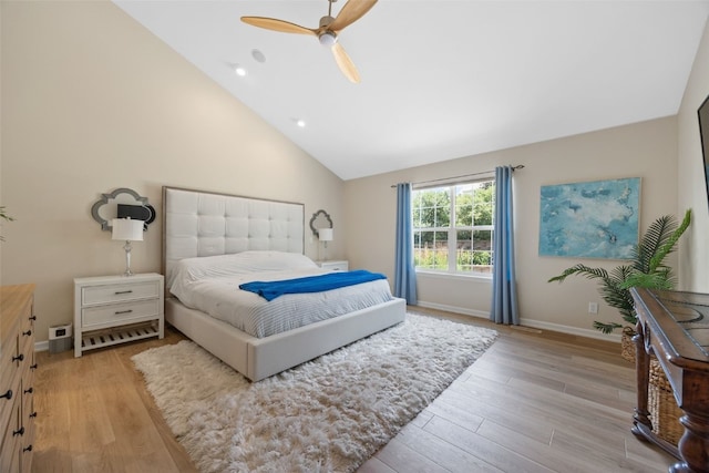 422 Rock Ridge Rd NW, Cedar Rapids, IA 52405 - bedroom with light wood finished floors, lofted ceiling, ceiling fan, and recessed lighting