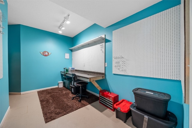 422 Rock Ridge Rd NW, Cedar Rapids, IA 52405 - home office featuring baseboards and track lighting