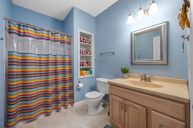 422 Rock Ridge Rd NW, Cedar Rapids, IA 52405 - bathroom with vanity, a shower with curtain, and tile patterned flooring