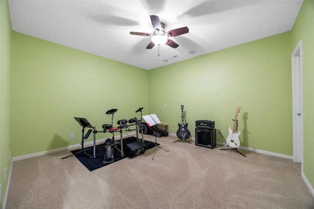 422 Rock Ridge Rd NW, Cedar Rapids, IA 52405 - exercise room featuring carpet flooring and ceiling fan