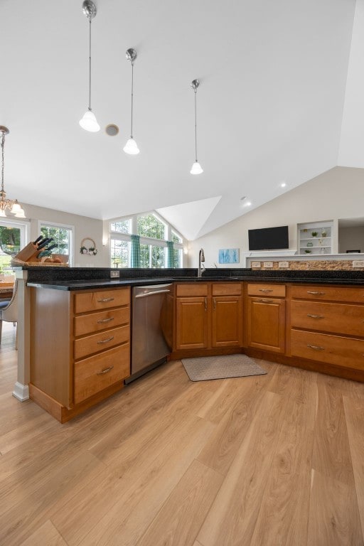 422 Rock Ridge Rd NW, Cedar Rapids, IA 52405 - kitchen with dishwasher, lofted ceiling, light wood-style flooring, pendant lighting, and brown cabinets