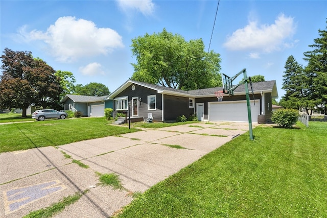 2113 Ridgewood Ave, Muscatine, IA 52761 - single story home featuring an attached garage, concrete driveway, and a front lawn