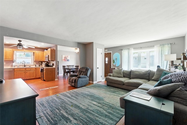 2113 Ridgewood Ave, Muscatine, IA 52761 - living room with light wood-type flooring and ceiling fan