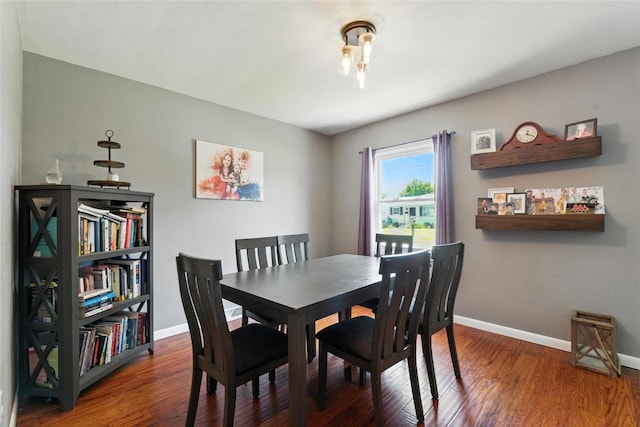 2113 Ridgewood Ave, Muscatine, IA 52761 - dining area featuring baseboards and wood finished floors