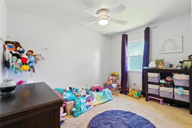 2113 Ridgewood Ave, Muscatine, IA 52761 - rec room with carpet floors and a ceiling fan