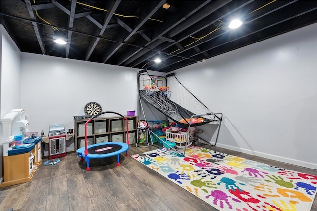 2113 Ridgewood Ave, Muscatine, IA 52761 - recreation room with wood finished floors and baseboards