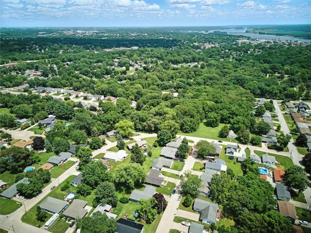 2113 Ridgewood Ave, Muscatine, IA 52761 - aerial view of property and surrounding area featuring nearby suburban area and a forest