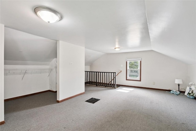 100 W Short St, Solon, IA 52333 - additional living space with carpet flooring and lofted ceiling