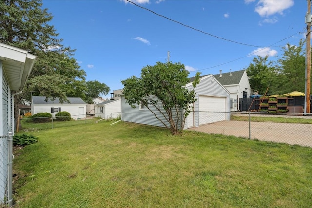 100 W Short St, Solon, IA 52333 - view of yard featuring a detached garage and an outdoor structure