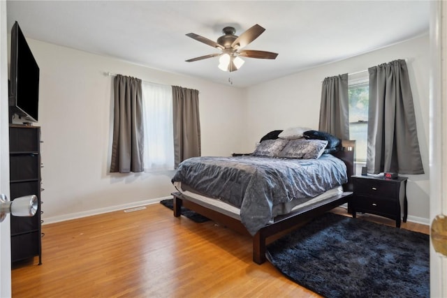 75 Jefferson Ave SW, Swisher, IA 52238 - bedroom featuring light wood-type flooring and ceiling fan