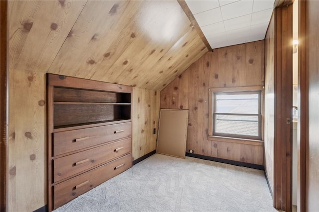 1727 Grande Ave SE, Cedar Rapids, IA 52403 - additional living space featuring lofted ceiling, light colored carpet, and wooden walls