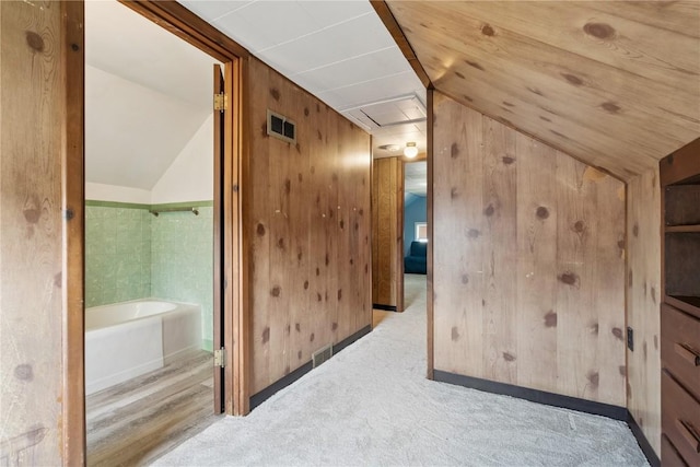 1727 Grande Ave SE, Cedar Rapids, IA 52403 - corridor featuring lofted ceiling, attic access, and carpet floors