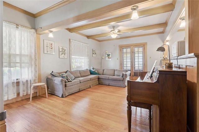 1727 Grande Ave SE, Cedar Rapids, IA 52403 - living area featuring beamed ceiling, light wood-type flooring, ceiling fan, and crown molding