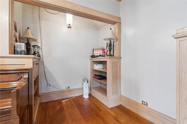 1727 Grande Ave SE, Cedar Rapids, IA 52403 - bathroom featuring wood finished floors and baseboards