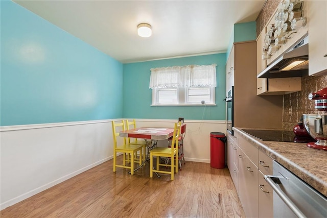 1727 Grande Ave SE, Cedar Rapids, IA 52403 - dining space featuring light wood-type flooring