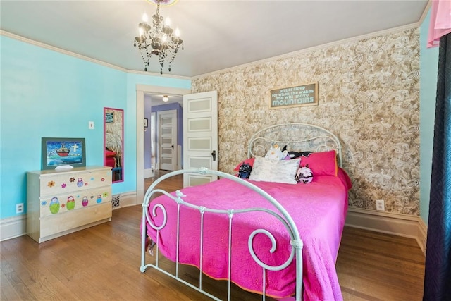 1727 Grande Ave SE, Cedar Rapids, IA 52403 - bedroom with a chandelier, wood finished floors, and crown molding