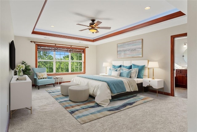 3037 Brookfield Dr, Marion, IA 52302 - bedroom with a tray ceiling, carpet, recessed lighting, ensuite bathroom, and a ceiling fan
