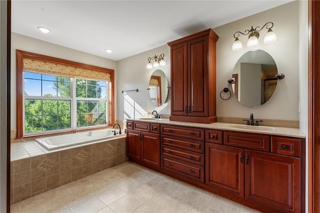3037 Brookfield Dr, Marion, IA 52302 - full bath with double vanity, tile patterned flooring, and tiled bath