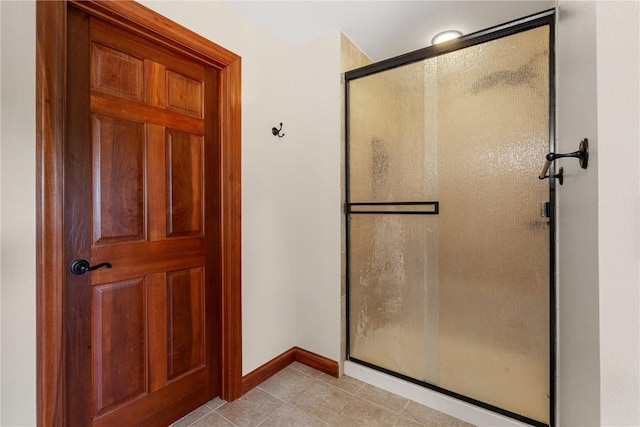 3037 Brookfield Dr, Marion, IA 52302 - full bath featuring a shower stall and tile patterned flooring