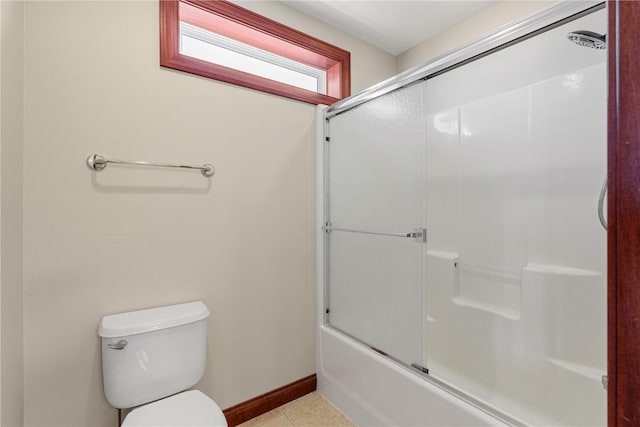 3037 Brookfield Dr, Marion, IA 52302 - bathroom with bath / shower combo with glass door and tile patterned floors