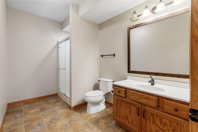 3037 Brookfield Dr, Marion, IA 52302 - full bath featuring a stall shower, vanity, and stone finish floors