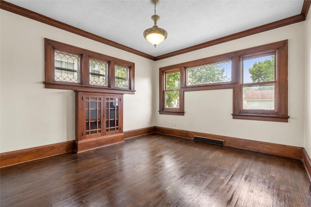 210 16th St SE, Cedar Rapids, IA 52403 - empty room with hardwood / wood-style floors and crown molding