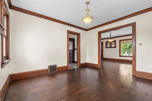 210 16th St SE, Cedar Rapids, IA 52403 - unfurnished room with crown molding and dark wood-style floors